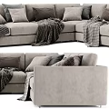 Modern Beige Upholstered Sectional Sofa With Plush Pillows And Cozy Blankets 3d model