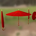 Red Umbrellas Open And Folded Hanging Against Green Outdoor Background