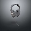 Gray Wired Over Ear Headphones With Modern Design And Comfortable Ear Cushions