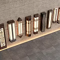 Various Modern Outdoor Lights Mounted On Stone Wall With Warm Glow And Tile Floor