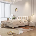 Cozy Double Bed With Upholstered Headboard Golden Legs Bedside Tables White Flowers And Wall Art