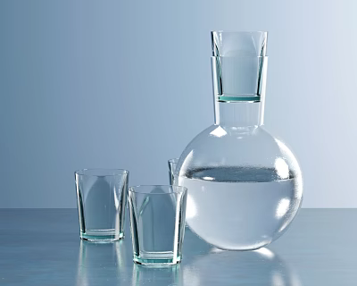 Two Transparent Drinking Glasses With Glass Bottle Containing Clear Liquid On Blue Tabletop 3d model