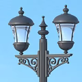 Double Head Outdoor Lamp With Black Pole Decorative Design Transparent Shade