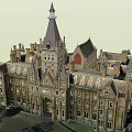 Historic Gothic Style Building With Stone Exterior Pointed Towers And Arched Windows