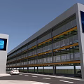 Modern Multi Story Parking Garage With Gray Exterior Yellow Railings And Blue Screens