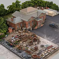 Red Brick Industrial Factory Building Surrounded by Trees With Black Vehicle and Machinery Yard