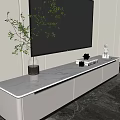 Modern Minimalist White TV Stand with Flat Screen TV Green Plant and Decorative Drawers