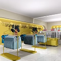 Bright Yellow Clothing Store With Arched Windows And Displayed Fashion Apparel