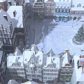 Aerial Planning View Of Winter Square With Snow Covered Ground Benches And Christmas Tree