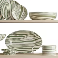 Green And White Striped Kitchenware Plates Bowls On Shelves