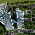 Twin Modern Skyscrapers Surrounded by Green Trees and Sea View Under Blue Sky