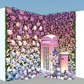 Vibrant Flower Wall with Pink Telephone Booth and Colorful Floral Decor