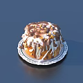 Delicious Chocolate Drizzle Cake With White Icing And Crushed Nut Toppings On Decorative Plate
