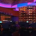 Stylish Modern Bar Lounge Interior With Illuminated Wine Racks And Plush Sofa