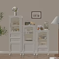 White Sideboard With Glass Doors In Dining Room Interior With Potted Plant And Coffee Maker