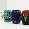 Various Decorative Stools Featuring Intricate Cutouts Geometric Patterns Gold Trims And Tassel Details