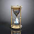 Ornate Hourglass With Gold Frame And Silver Glass Showing Reflection On Black Surface
