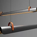Modern Long Cylindrical Pendant Light With Black Body Orange Leather Straps And Gold Accents