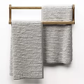 Black Striped Towels Hanging on Wooden Rack for Bathroom Decor