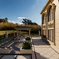 Classical Detached Villa Exterior With Ornate Balcony Large Arched Windows Iron Fence And Lush Greenery