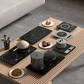 Modern Kitchen Appliances On Wooden Table With Induction Cooktops Pots Plates With Cookies And Eggs