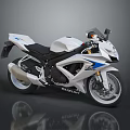 White And Blue Suzuki Sports Motorcycle With Black Seat Alloy Wheels And Sporty Design