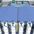 Industrial Factory Exterior With Blue Roof And White Storage Silos