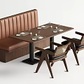 Banquette Sofa In Brown With Tufted Backrest And Wooden Dining Table With Woven Chairs