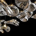 Contemporary Artistic Metallic Chandelier With Irregular Shapes Multiple Components And Hanging Design