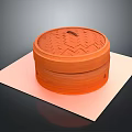Traditional Orange Bamboo Steamer with Lid on Pink Mat for Kitchen Use