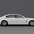Modern White Sedan With Sleek Body Design And Stylish Alloy Wheels