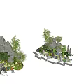 Rockery Stones Decorative Arrangement With Bamboo Ferns Pebbles and Potted Plants in Garden Setting