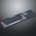 Sleek Computer Keyboard Featuring Black Gray Keys And Red Accent Key Design