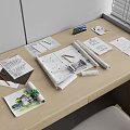 Architectural Design Workspace With Blueprints Drawings Pencils Colored Pens And Rolled Plans
