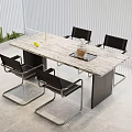 Modern Marble Dining Table With Black Chairs Lemon And Glass Container In Bright Room