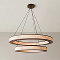 Modern Double Ring Wooden Chandelier With Light Brown Finish And Decorative Patterns Hanging From Ceiling
