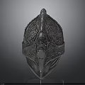Ancient Silver Helmet With Intricate Decorative Carvings And Ornate Medieval Design