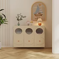 Beige Side Cabinet With Three Round Doors Round Knobs And Decorative Vase Dolls Table Lamp 3d model