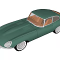 Vintage Green Sports Car With Brown Interior And White Wheels Design
