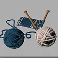 Knitting Supplies With Blue Pink Yarn Balls Wooden Needles And Blue Patterned Fabric
