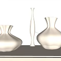 Three White Textured Vases Displayed On Light Colored Countertop With Beige Background 3d model