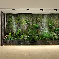 Indoor Vertical Garden Wall With Waterfall And Lush Green Plants