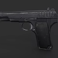 Black Tactical Pistol With Textured Body Magazine And Green Muzzle Tip