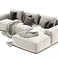Cozy Sectional Sofa With Plush Pillows Striped Blankets And Neutral Fabric Upholstery