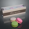 Colorful Macarons In Box Packaging With Three Pastel Colored Sweet French Dessert Treats