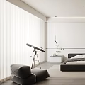 Modern Bedroom Interior With Black Bed White Cabinets Portrait Artwork And Natural Light