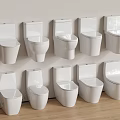 White Toilets Featuring Various Designs Neatly Arranged Against Wall Display Collection 3d model