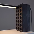 Modern Desk Lamp With Long Strip Light And Square Base Featuring Circular Holes