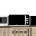 Modern Kitchen Appliances Including Microwave And Oven On Wooden Countertop