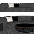 Irregular Shaped Quilted Sofa With White Black Pillows And Round Marble Coffee Table 3d model